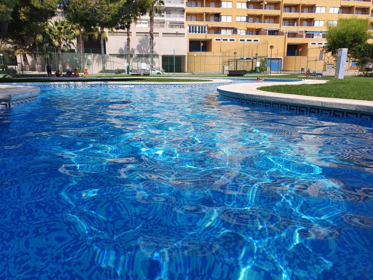 Apartment In Campoamor Overlooking The Swimming Pool Buitenkant foto