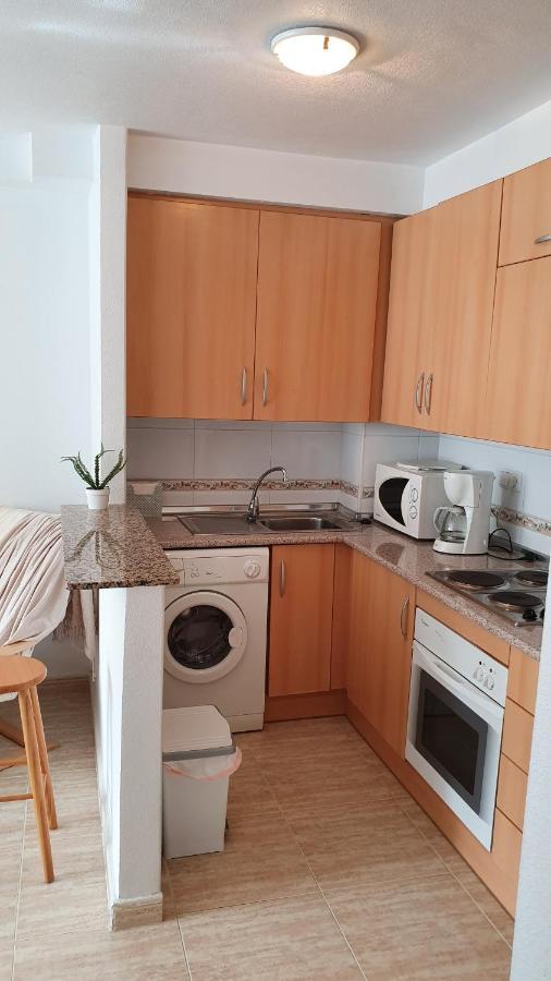 Apartment In Campoamor Overlooking The Swimming Pool Buitenkant foto